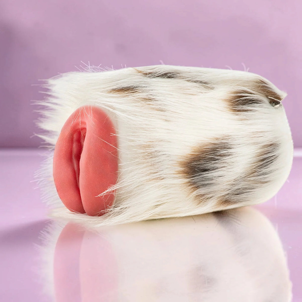 Platinum silicone furry masturbator, calico cat, front view